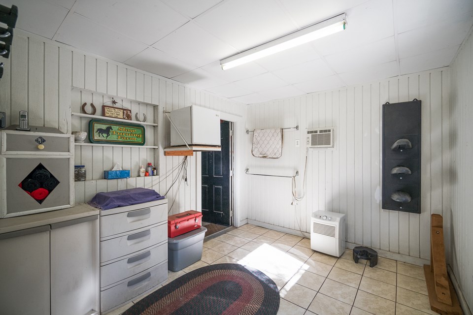 tack room with wall a/c unit