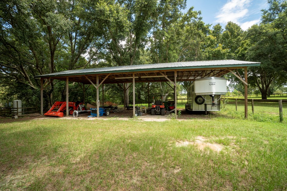 horse trailer and farm equipment storage