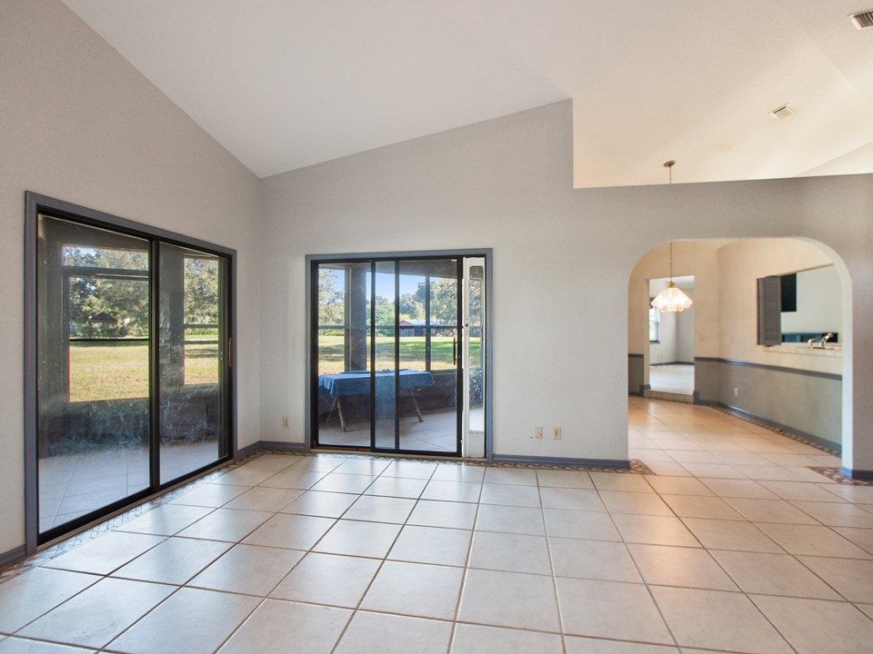 nice flow to the adjoining dining room and access to the rear, enclosed porch