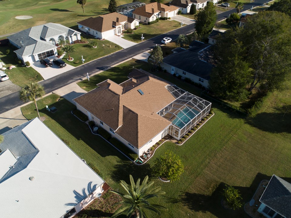 professional landscaped & maintained with concrete curbing & irrigation