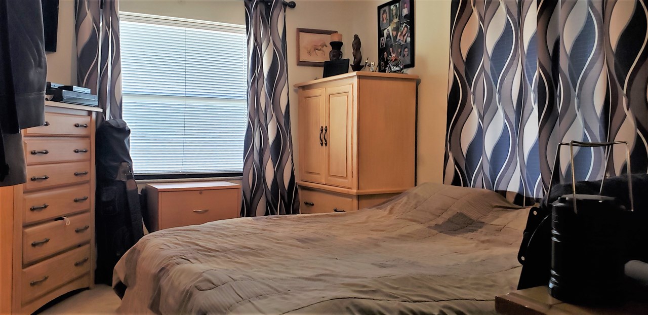 the primary bedroom features a walk-in closet and ensuite bath