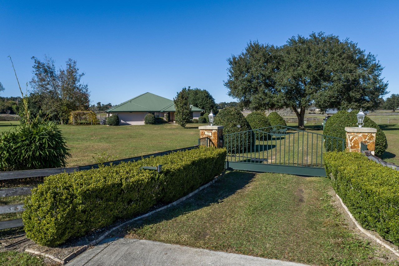 custom 4/2 ranch style home with gated entry