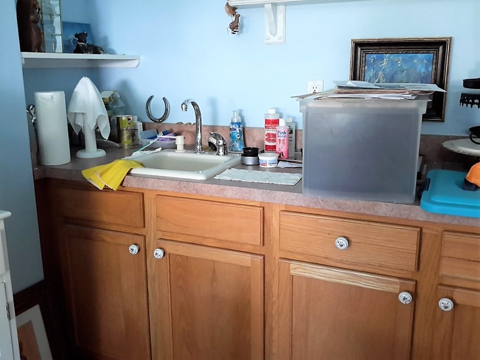 studio cabinet and utility sink.