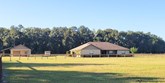 5 acre horse farm in citra has a quality built 3/2, fantastic workshop, barn & more!